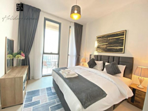 Mira Holiday Homes- Beautiful 1 bedroom in Midtown-Gym & Pool- Parking
